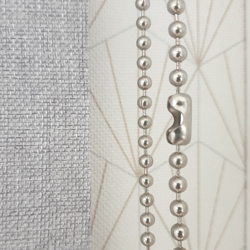 Connexion métal pour chaînette de store enrouleur